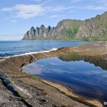 Water was so clear that the skies are reflected on the pool of water at Tungeneset, SENJA