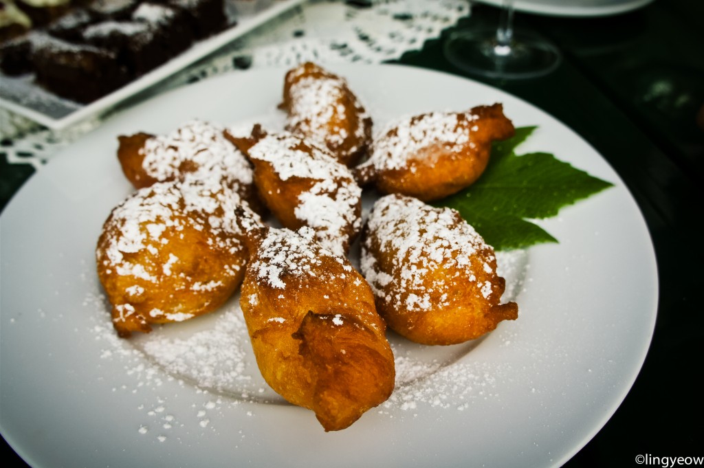 Fried corn fritters with dust of icing sugar - so simple but oh, so good!