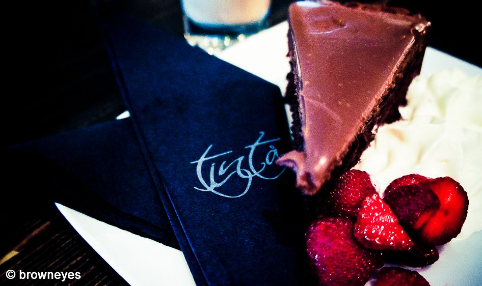 Choc cake with coffee while watching people passes by @ Tinta, Turku