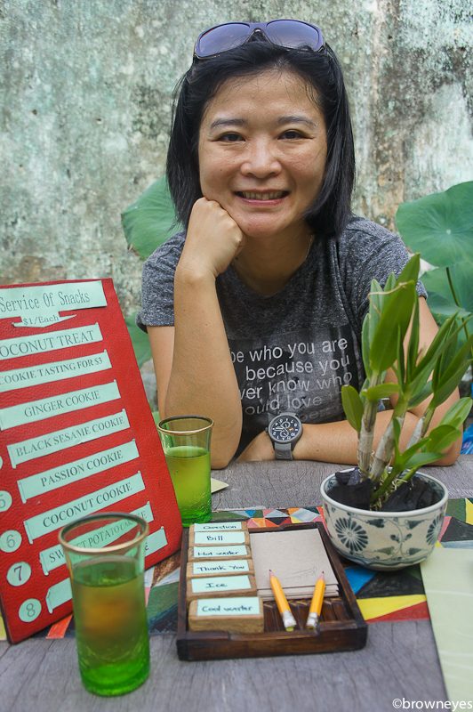 Enjoying tea at a unique cafe, Reaching Out Tea House, where all its staff are unable to hear or speak, but go with sign languages and written blocks like these.